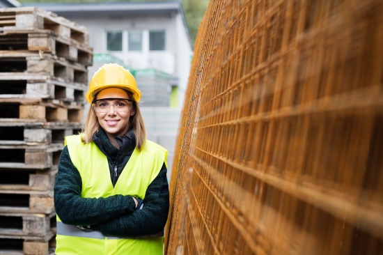 gallery/young-woman-worker-in-an-industrial-area-p8pemcd